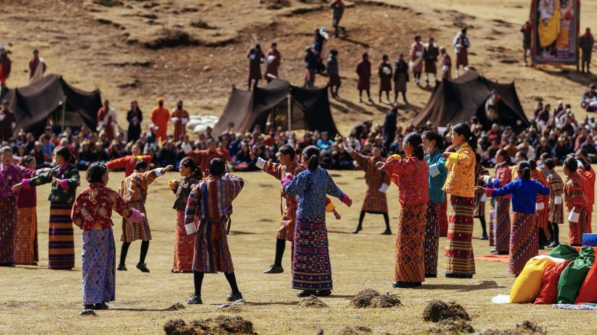 Dancers in traditional dress at the Royal Highland Festival in Laya, Bhutan